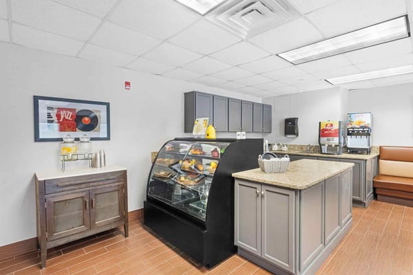 Interior view of a snack bar area with food display