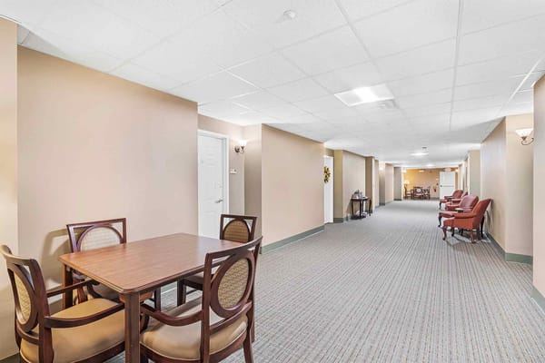 Interior view of a hallway and common seating area