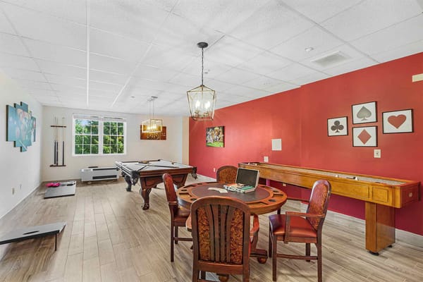 Recreation room with pool table and card table