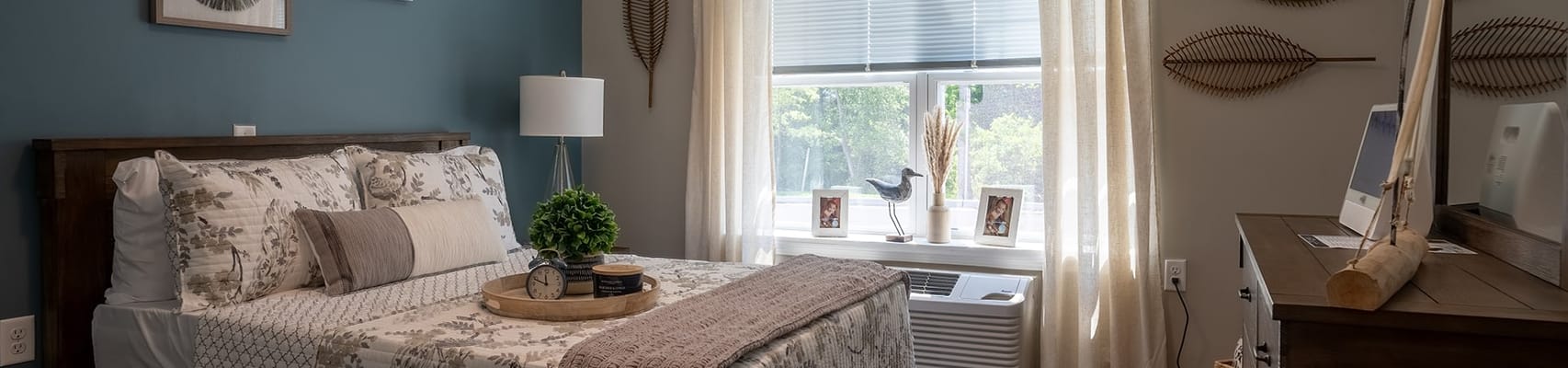 Cozy and inviting interior room with a neatly made bed