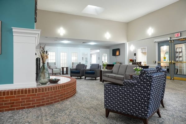 Bright lounge area with comfortable seating and decor