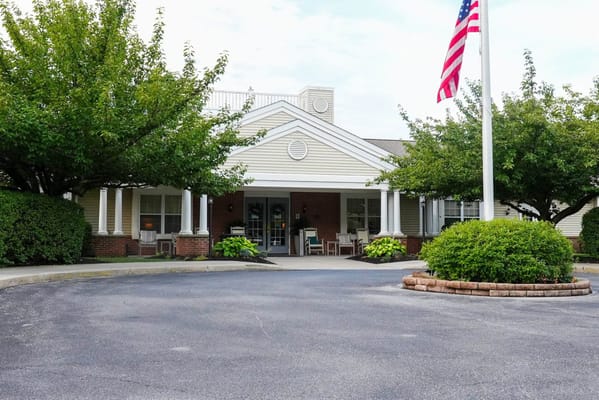 Exterior view of the facility with American flag
