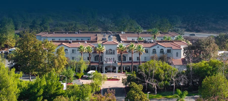 Aerial view of the Bayshire San Dimas building and surroundings