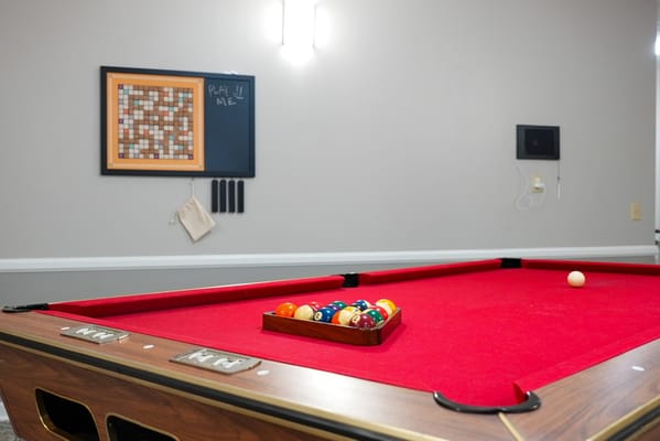 Pool table in a recreational room