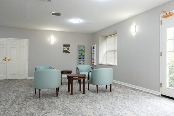 Interior common area with seating and natural light