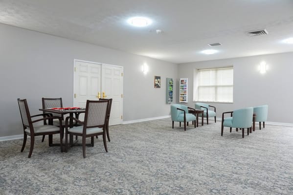 Comfortable common area with seating and dining table