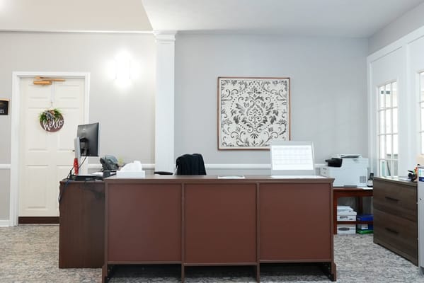 Reception area with a welcoming desk and decor