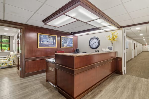 Reception area with a front desk and artwork