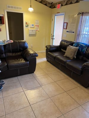 Cozy common area with two leather sofas