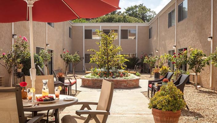 Beautiful courtyard with seating and flowers