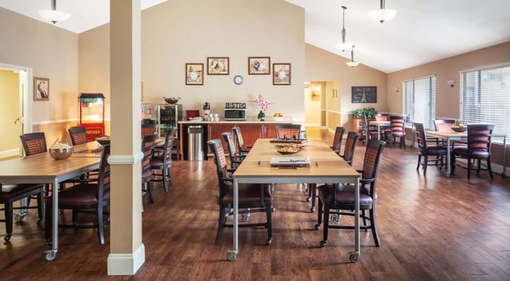 Bright dining area with tables and chairs