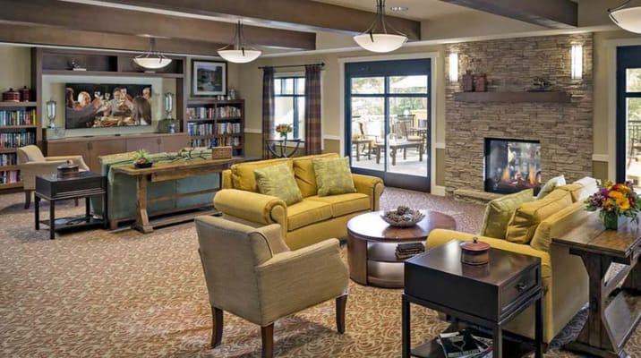 Cozy common area with seating and a fireplace