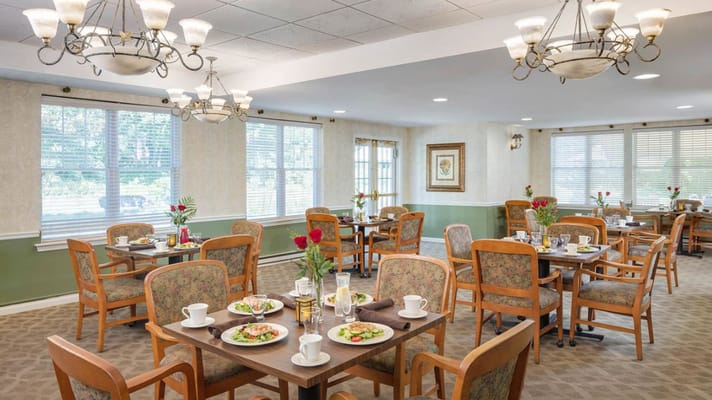 Dining room with tables set for lunch service