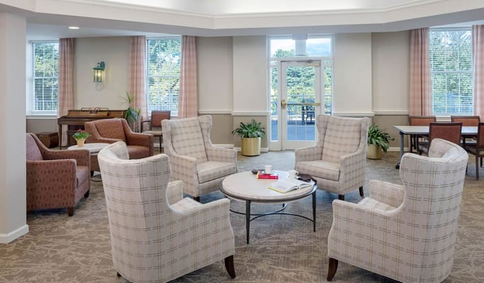 Bright common area with seating and decor
