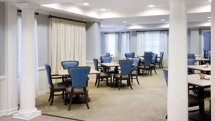 Dining room area with tables and chairs
