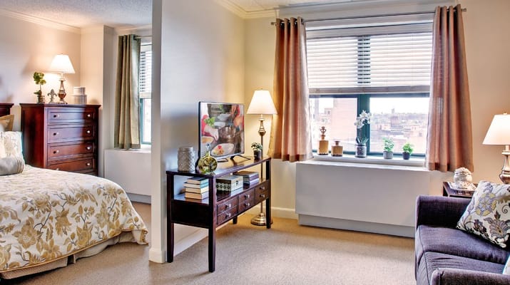 Cozy interior of a private resident room with bright lighting