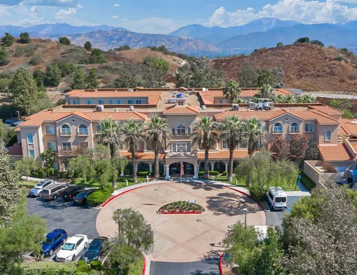 Aerial view of Bayshire San Dimas building and grounds
