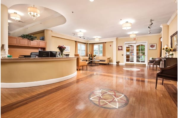 Interior of the facility lobby with seating and reception desk