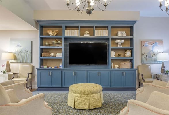 Common area with seating and a television.