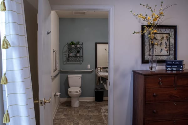 Brightly decorated bathroom in a resident room