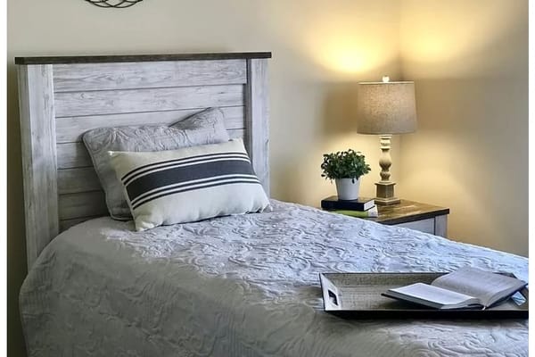 Cozy private bedroom with warm lighting