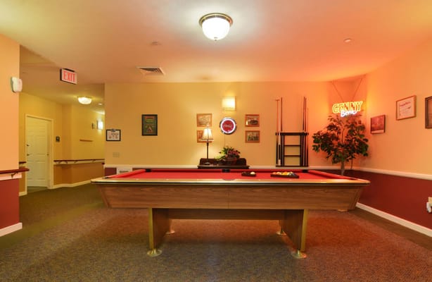 Interior view of a game room with a pool table