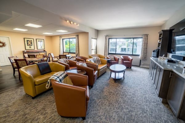 Comfortable common area with seating and tables