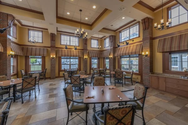 Bright dining room with tables and chairs