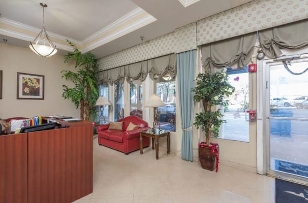 Bright lobby area with seating and plants