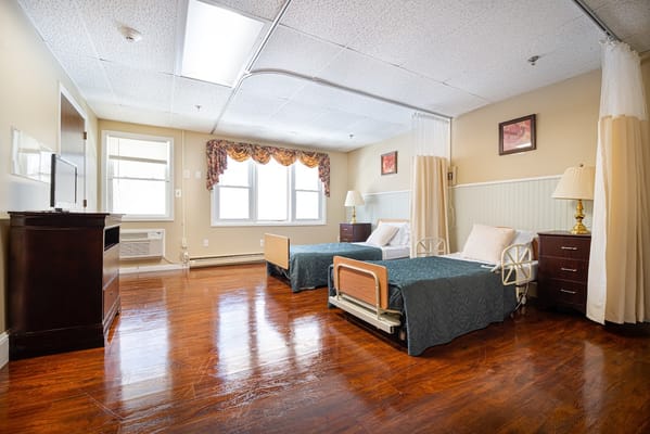 Interior view of a shared resident room with two beds