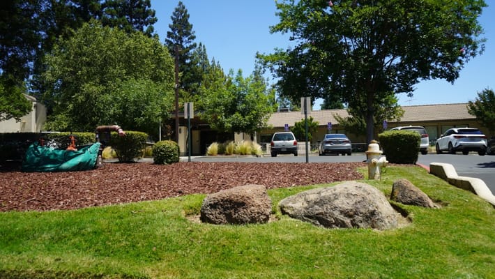 Outdoor view of the facility entrance and landscaping