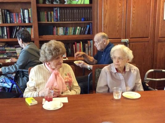 Residents enjoying conversation in a common area