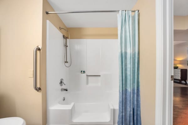 Modern bathroom with a shower and safety features