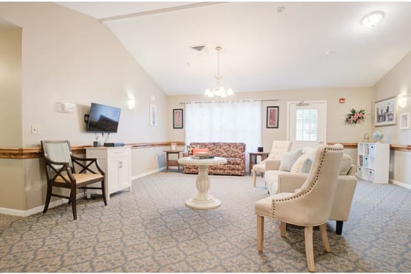 Common area with seating and television