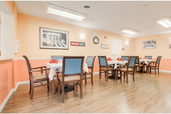 Dining area with tables set for a meal