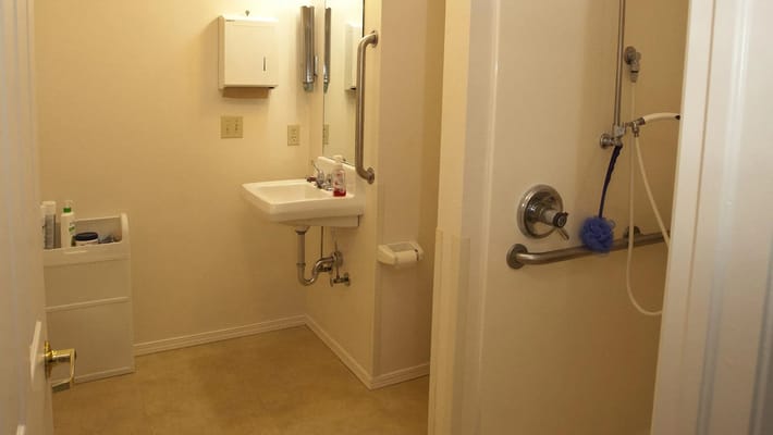 Interior view of a clean bathroom in a care home
