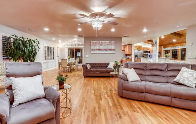 Bright common area with comfortable seating and decor