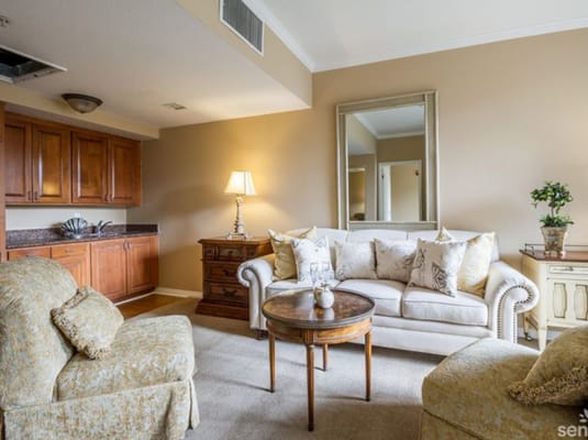 Cozy interior living space with a sofa and dining area