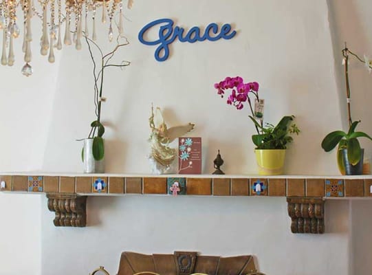 Decorative interior space with plants and wall decor