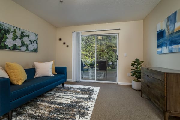 Bright interior lounge with access to outdoor space