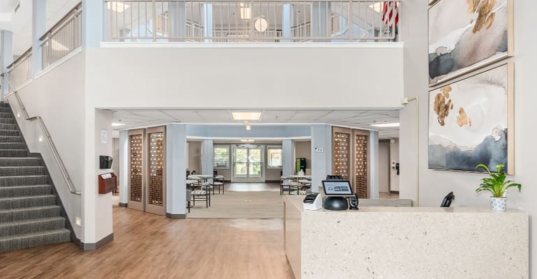 Welcoming lobby area with a reception desk and seating