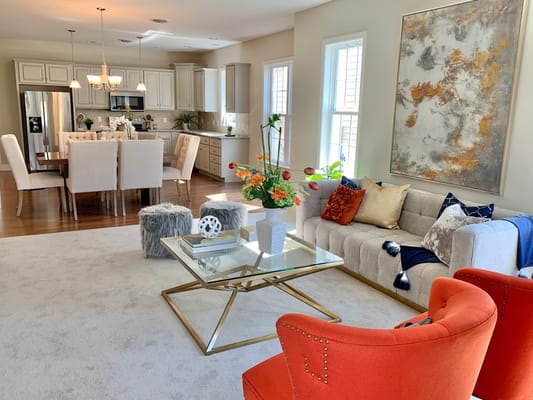 Bright common area with stylish furniture and decor