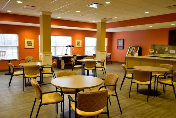 Interior common area with seating and tables