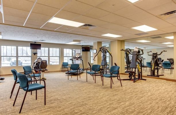 Interior view of a fitness area with exercise equipment