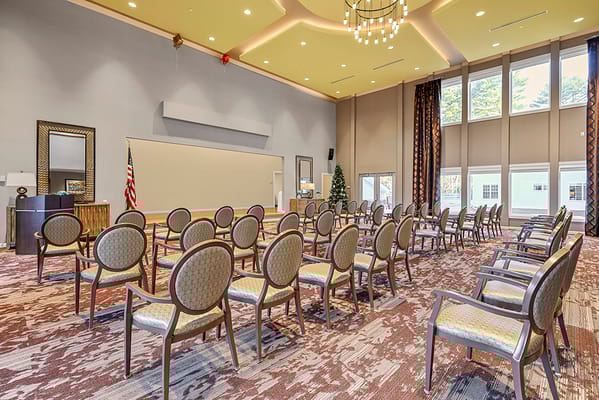 Interior view of an empty activity room with chairs arranged
