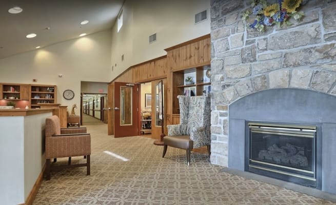 Cozy common area with a fireplace and seating