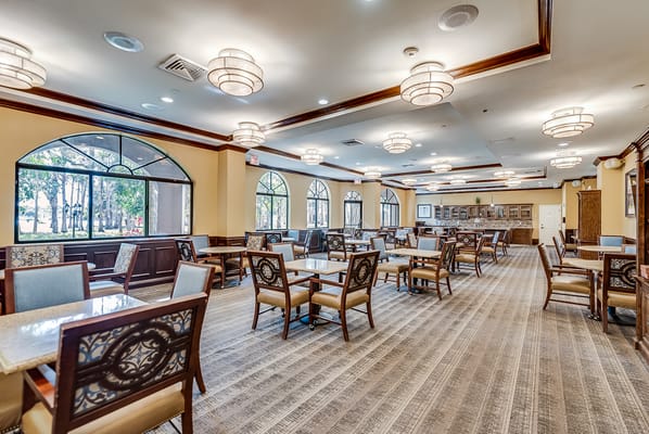 Spacious dining area with tables and chairs