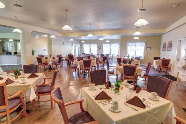 Dining room with tables set for meals
