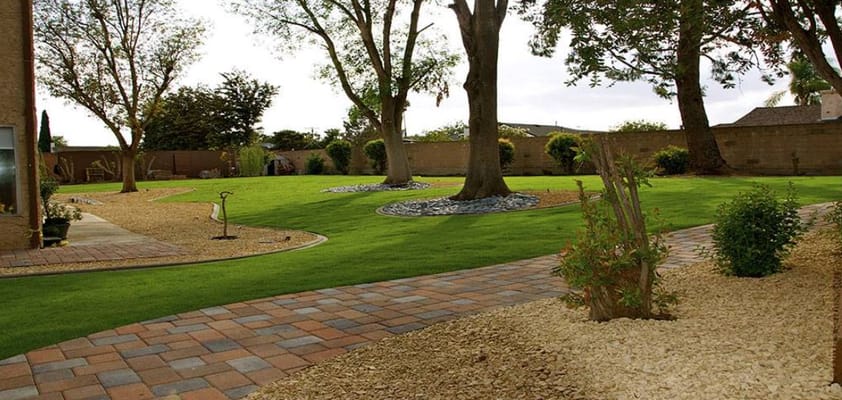 Well-maintained garden paths with greenery