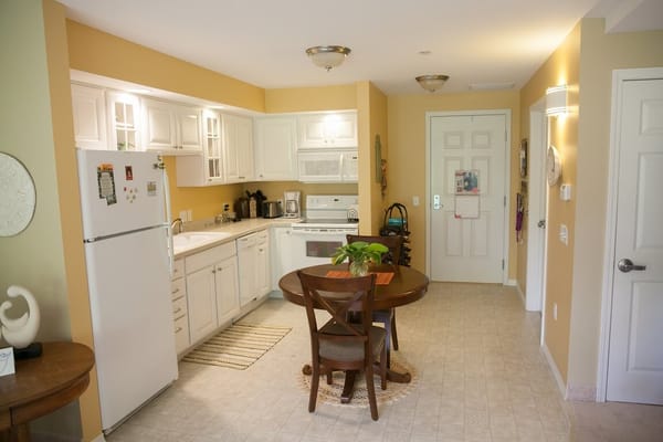 A well-lit kitchen area in a senior living facility